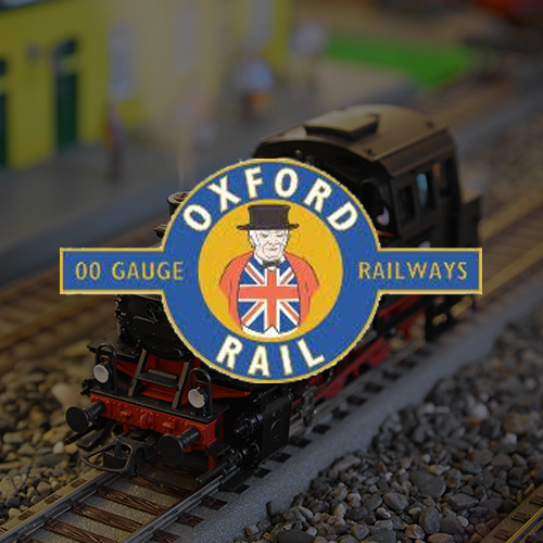 model train on a railway track with Oxford Rail branding showcasing 3 gauge model railways